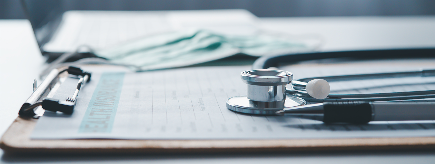 a clipboard and a stethoscope